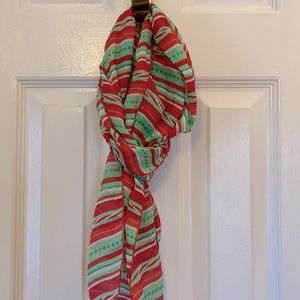 Woman’s candy cane holiday scarf